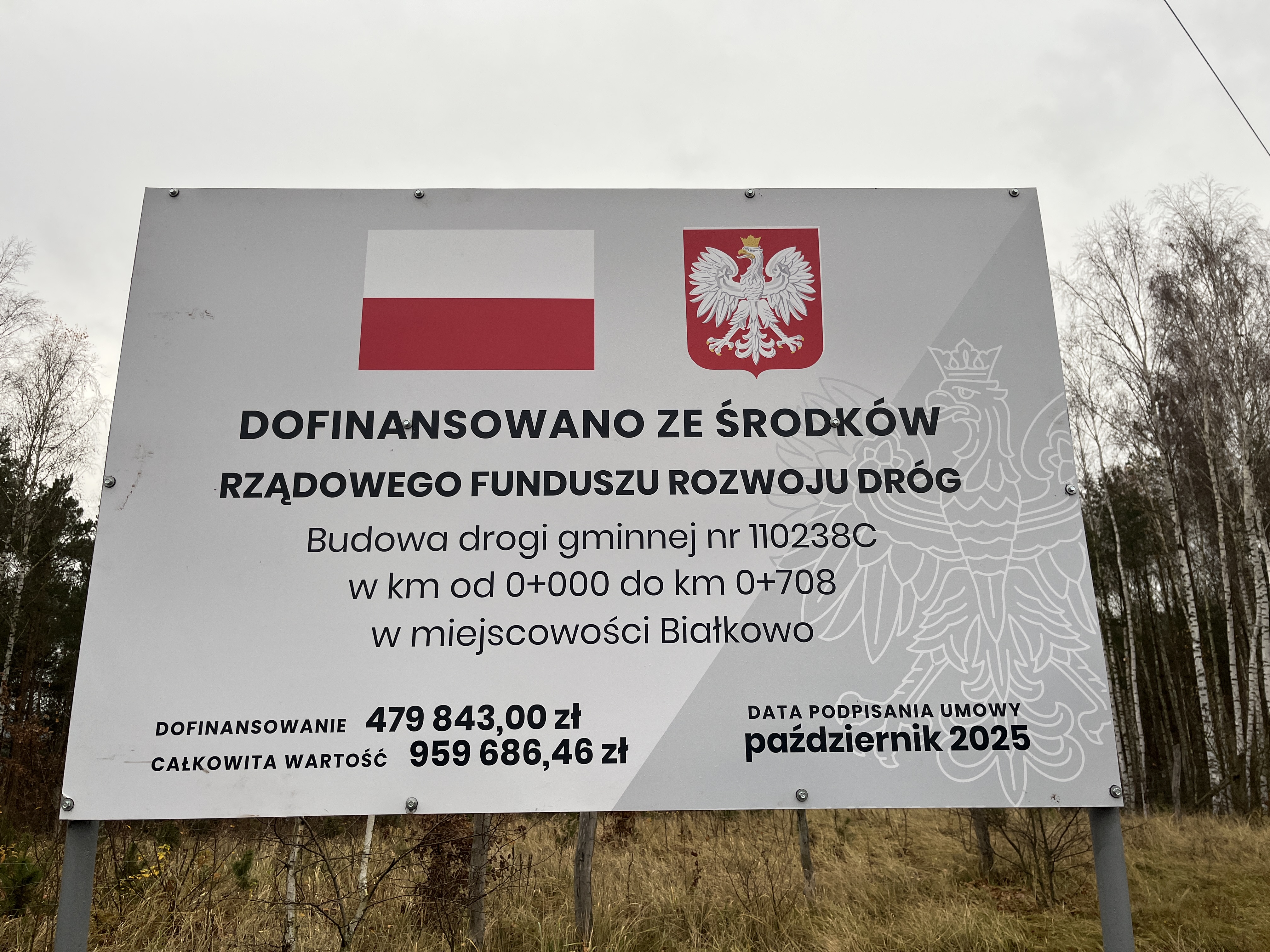 Odbiór końcowy drogi 110238C w miejscowości Białkowo - tablica informująca o dofinansowaniu